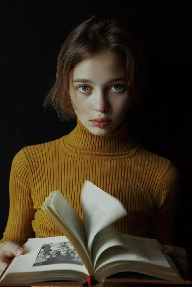 Attractive and impressive profile picture from photoshoot with beautiful bookworm girl