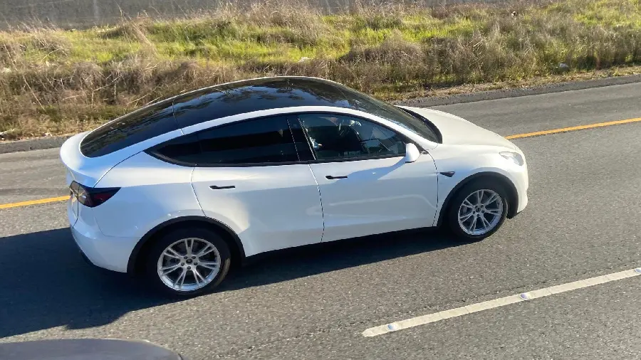 Tesla Model 3 sedan photo high resolution