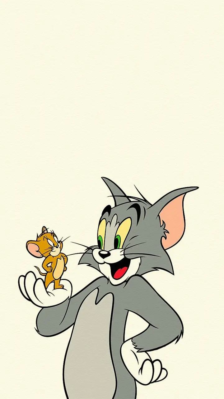 Tom And Jerry Cartoon Wallpaper With Classic Chase Scenes