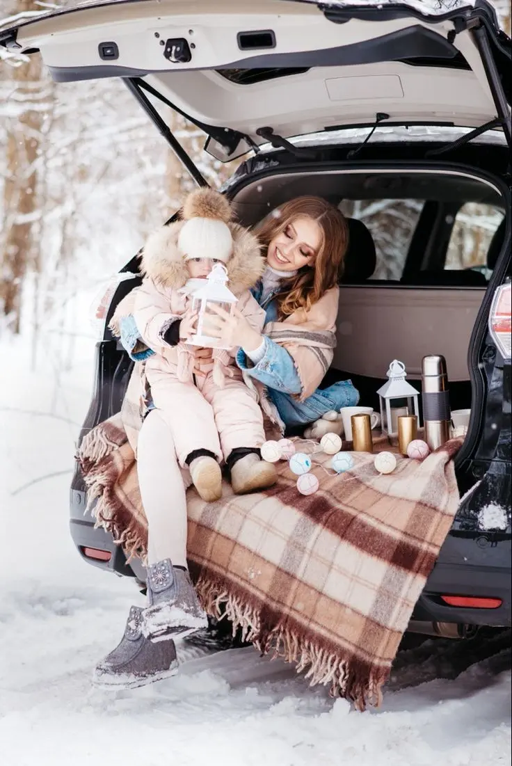 Mother and child profile picture on snowy winter day with heartwarming scene