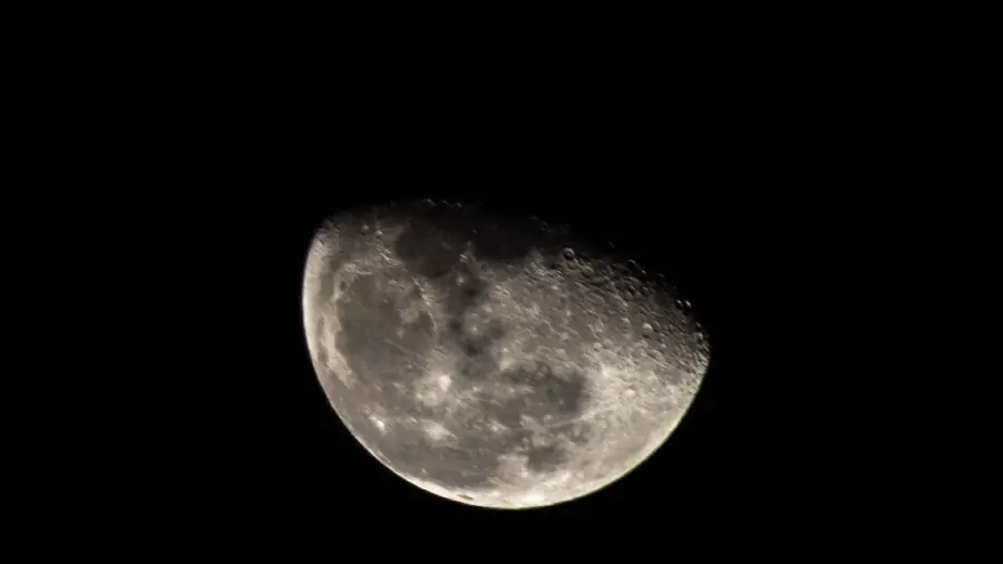 Half moon in clear night sky wallpaper celestial view