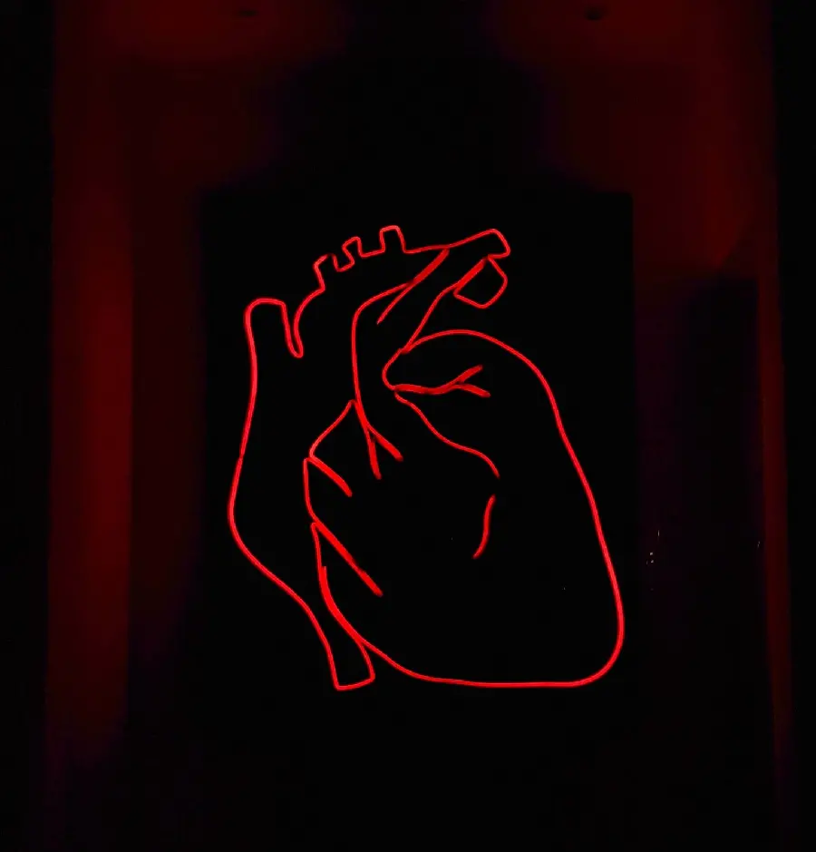 Glowing neon romantic heart image for standout social profiles