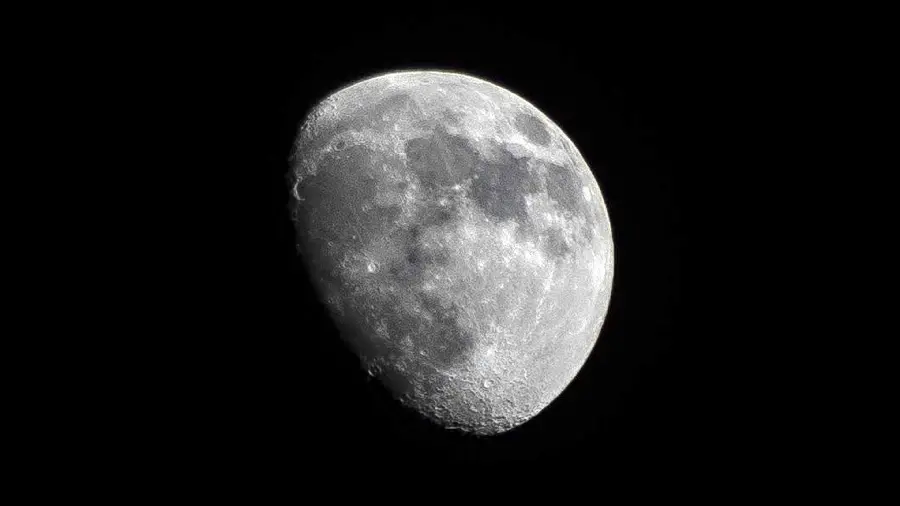 Close up moon wallpaper with detailed lunar surface features
