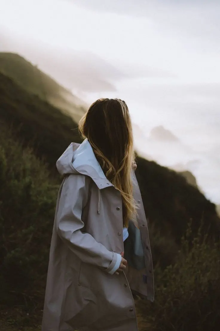 Girl back view in pristine mountain nature profile picture