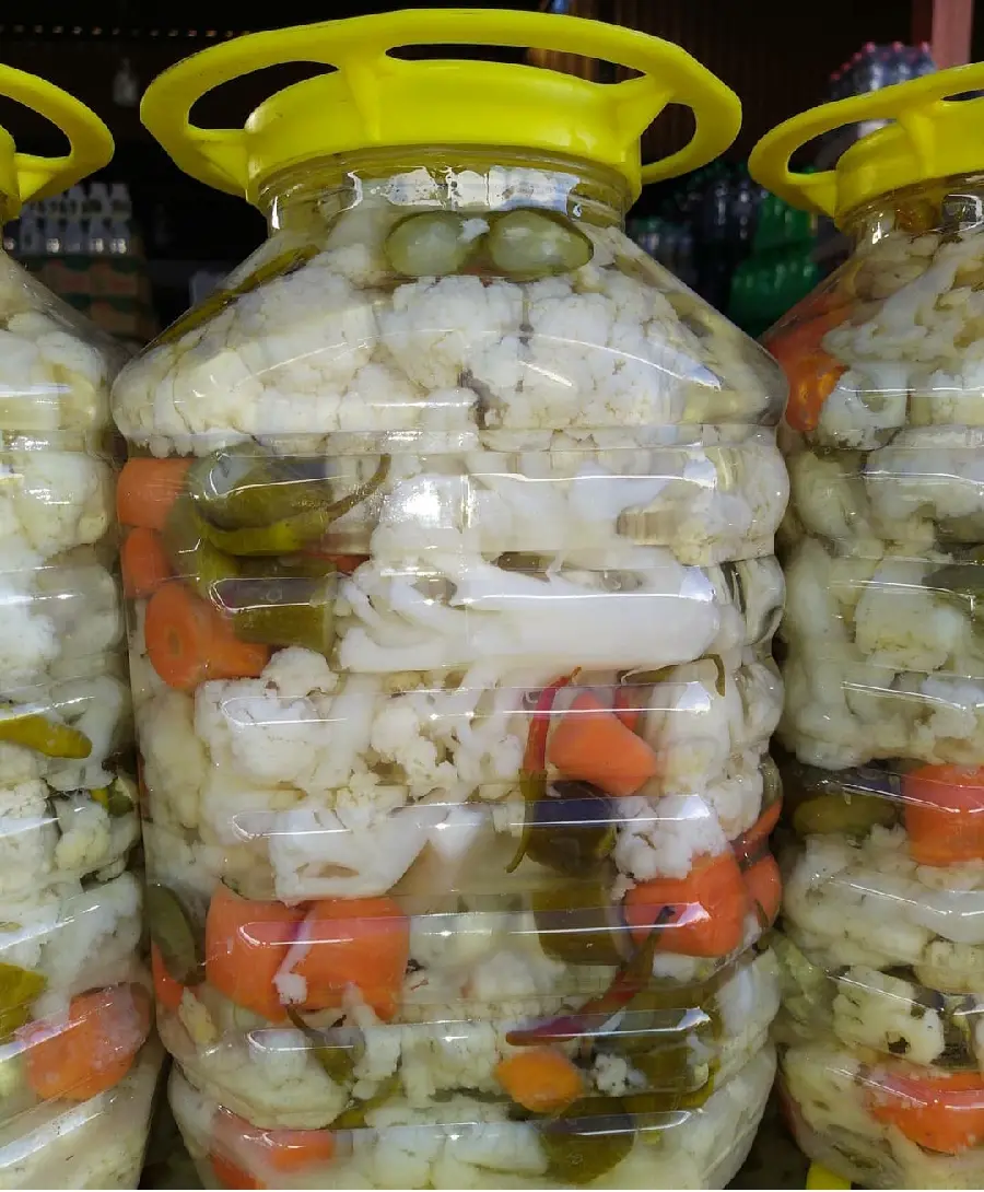 Image of white cauliflower pickles in simple homemade packaging