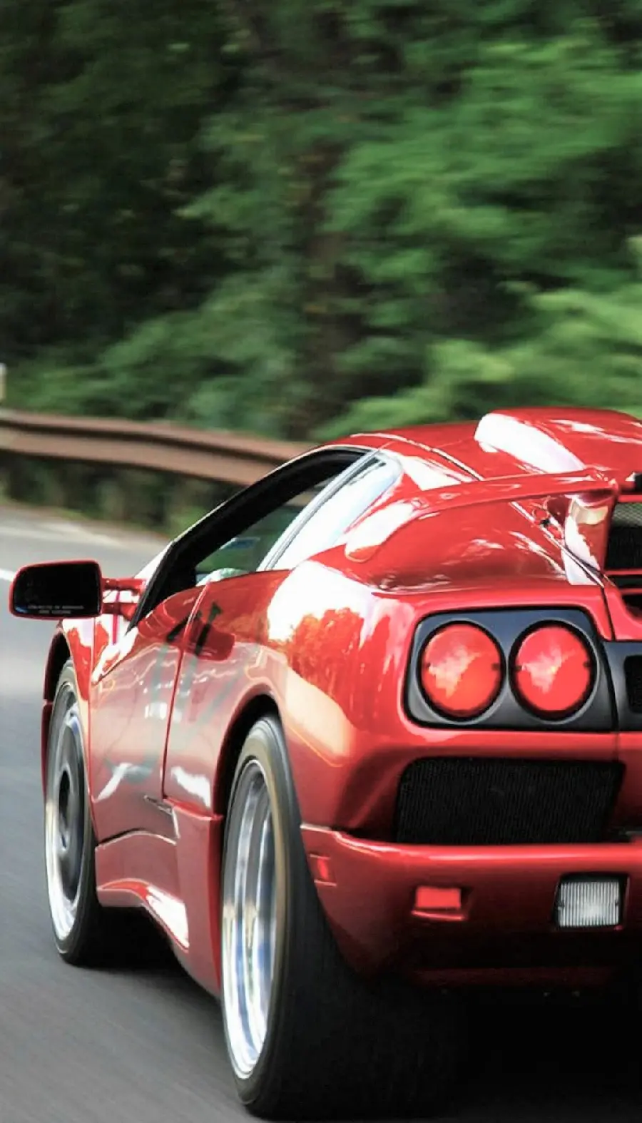 Red Ferrari sports car wallpaper for smartphone backgrounds