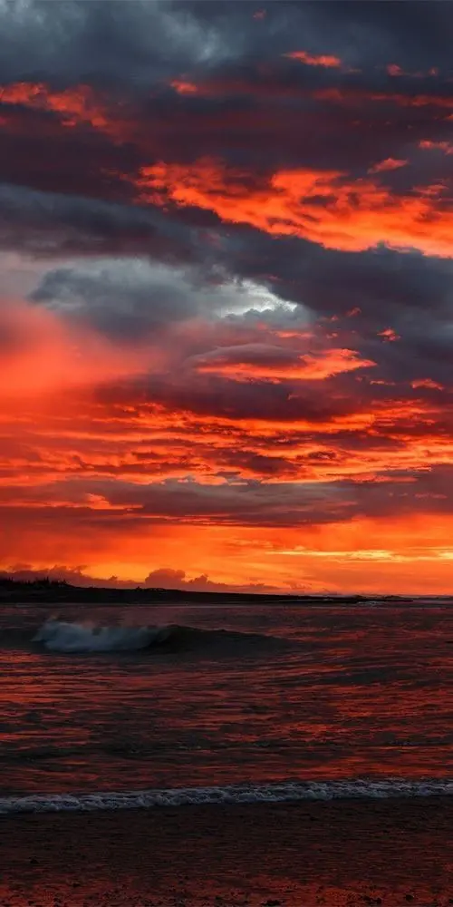 Orange sunset wallpaper for iPhone 13