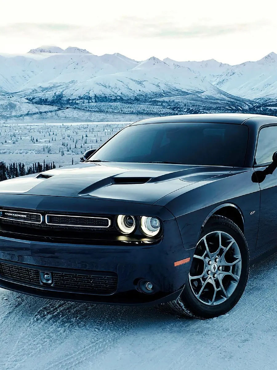 Black Dodge car wallpaper in winter season for smartphones