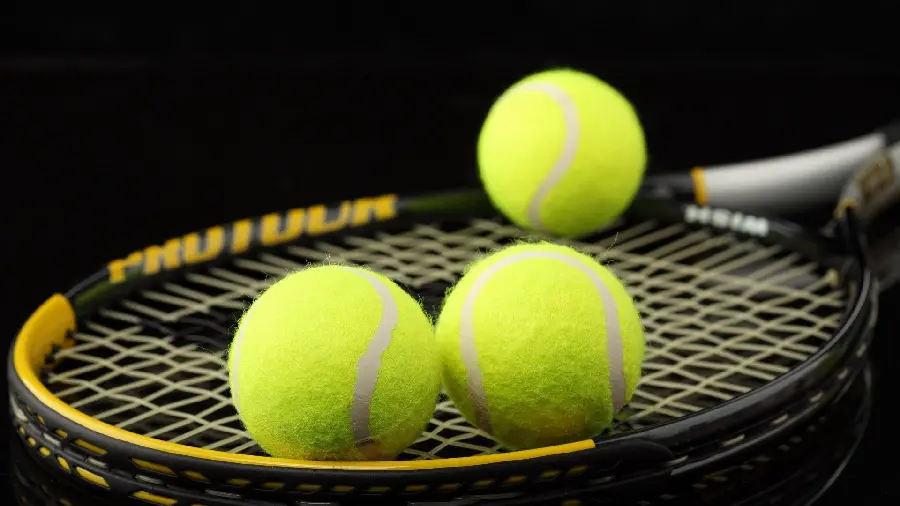 Photos of Tennis Ball and Racket