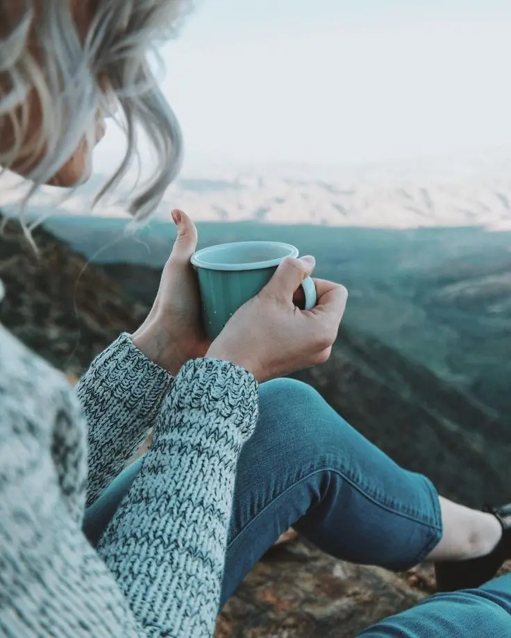 Girl with hot drink in winter nature profile picture