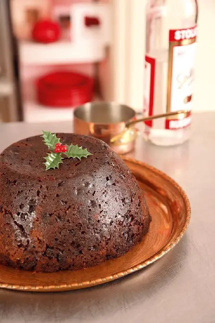 Traditional chocolate plum pudding or cake photo for World Plum Pudding Day
