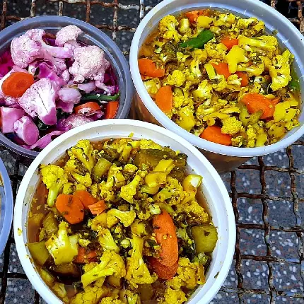 Image of yellow and red mixed homemade pickles for recipes
