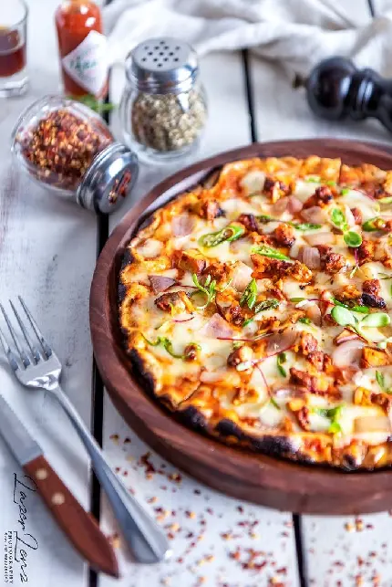 Download World Pizza Day Photo with Tasty Colorful Toppings