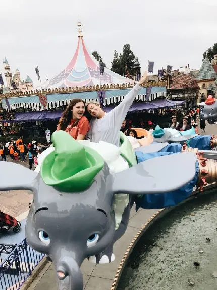 Energetic girl at amusement park profile picture