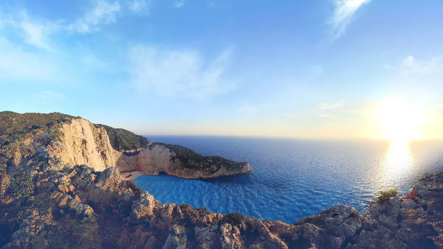 A spectacular image of a part of the ocean surrounded by rocks in original quality