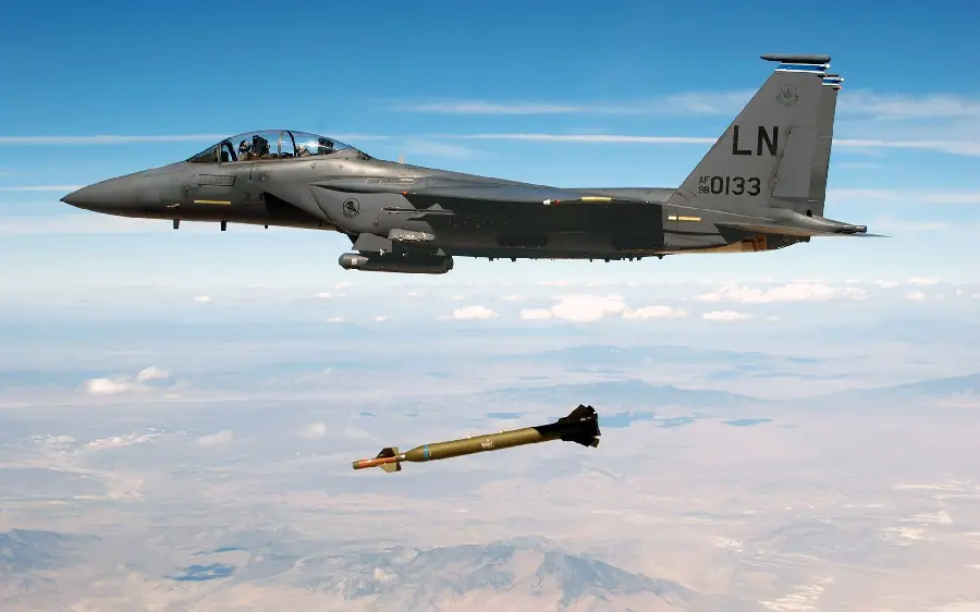 A spectacular wallpaper of a missile being launched from a missile-launching aircraft in the sky suitable for Windows 11