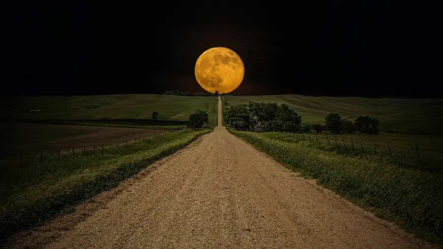 A very beautiful and fantasy photo of the moon along the road