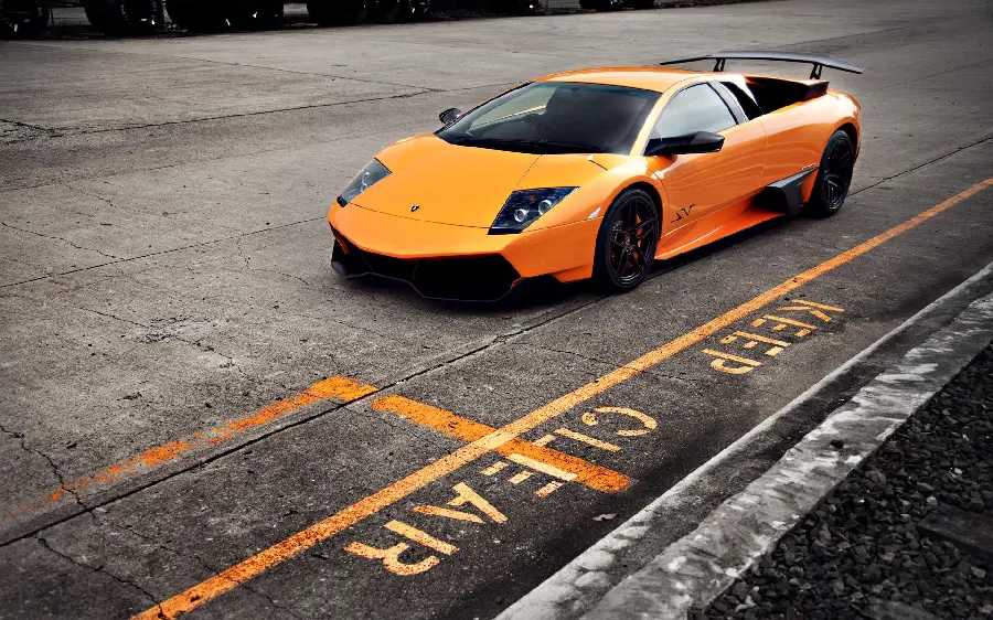 Wallpaper of Lamborghini Murcielago car with yellow color on the road for profile in HD quality