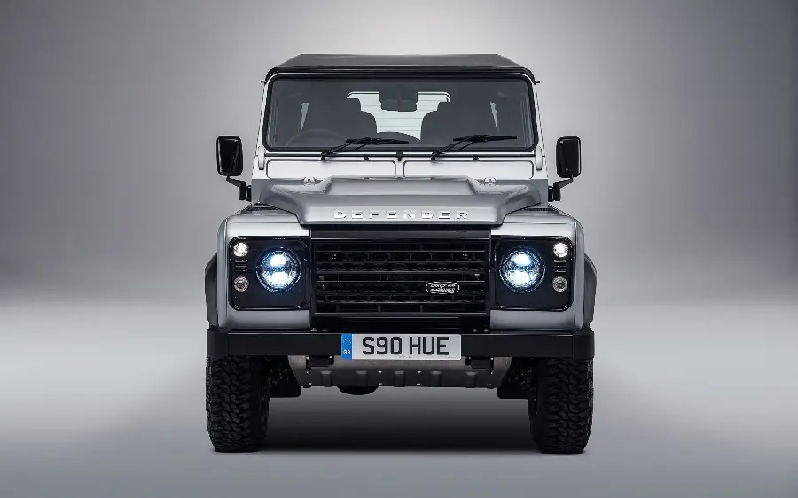 Download Land Rover Defender V8 2022 Front and Side View Wallpaper