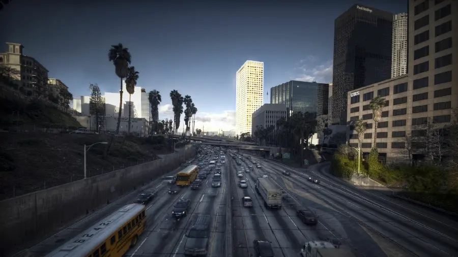 Photo of Los Angeles street with famous tower in downtown