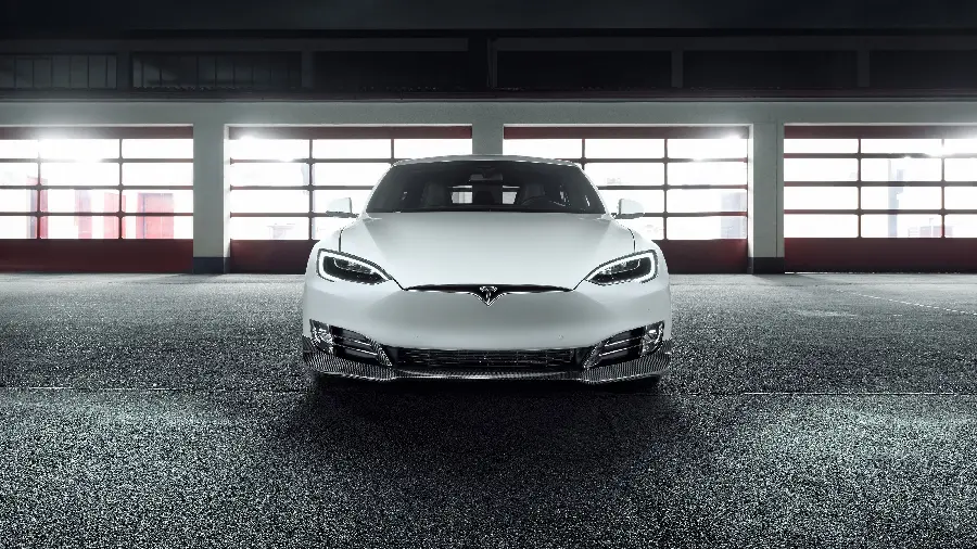 Photo of the front of a Tesla, an economical and attractive car