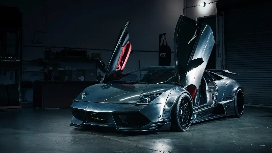 Background of Lamborghini Murcielago silver color very attractive with open doors for windows and post Instagram