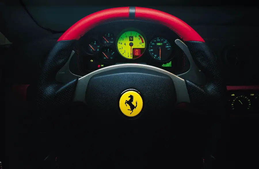 Download Ferrari car logo with horse logo with dark theme for wallpaper