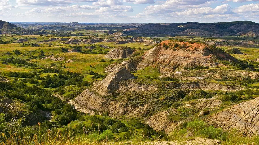 Photo of Badlands National Park with spring greenery