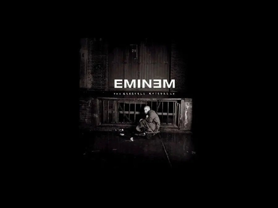 Eminem background with a dark background in a place like a prison