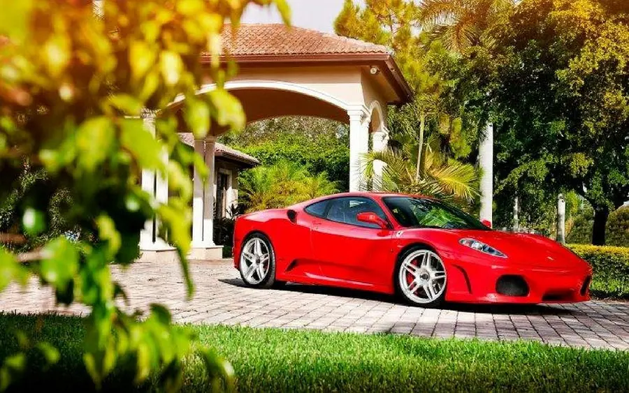 Ferrari car wallpaper with classic wheels and modern design