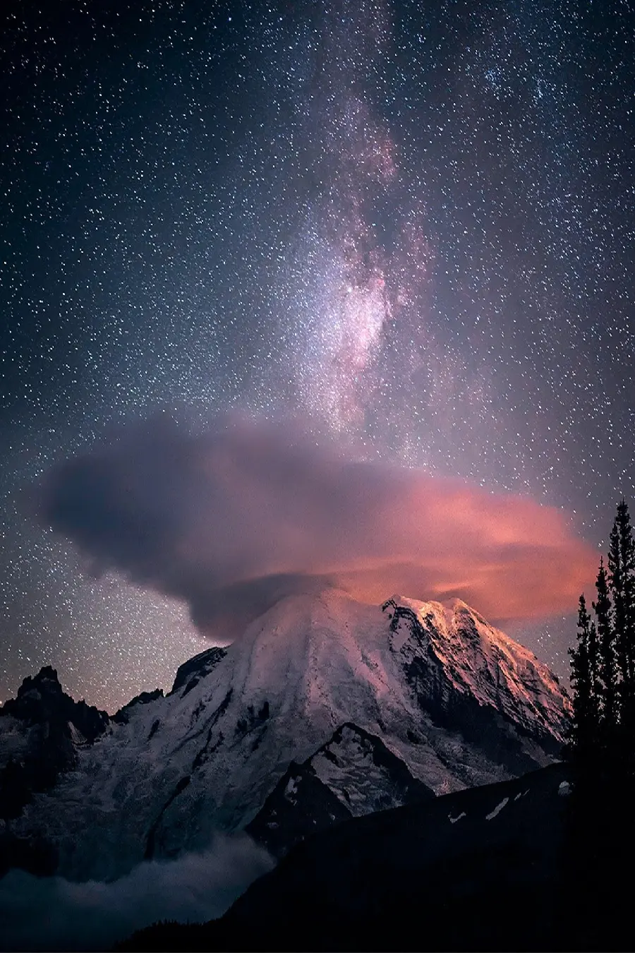 Download iPhone and Apple backgrounds for iOS 10 with an active volcano and beautiful stars