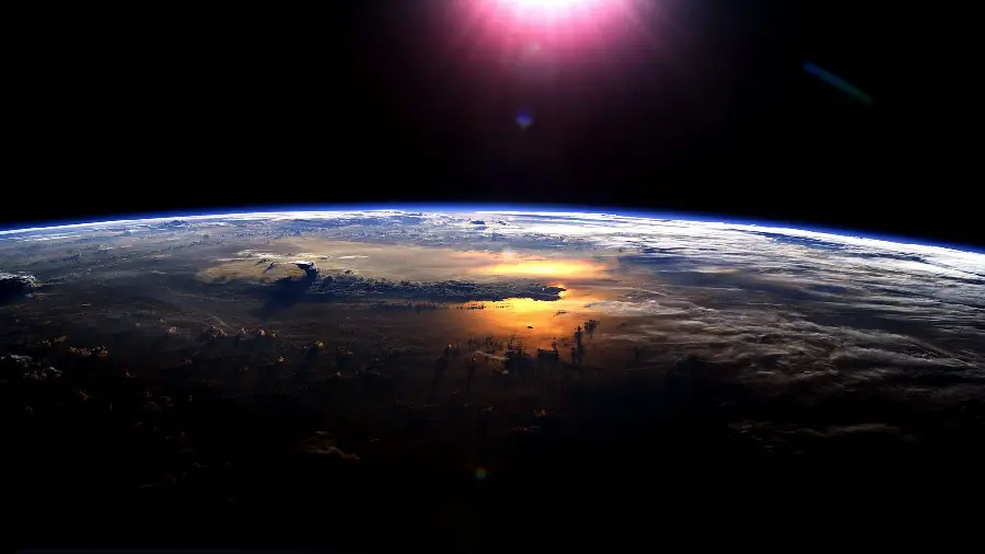Real and unique background photo of pink light hitting the Earth's surface from NASA at the beginning of the day