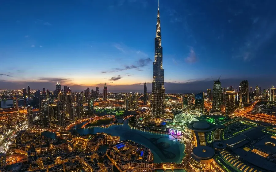 Photo of Dubai city at night for use as wallpaper and background