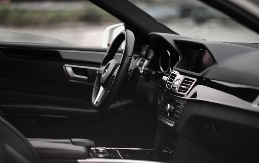Cute and close black and white image from inside the Mercedes-Benz E300