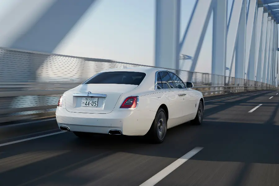 Rolls Royce foreign sports car photo with beautiful creativity and white color