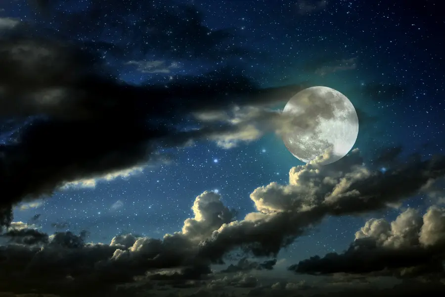 Beautiful and interesting wallpaper of the moon and its hiding under the clouds for mobile