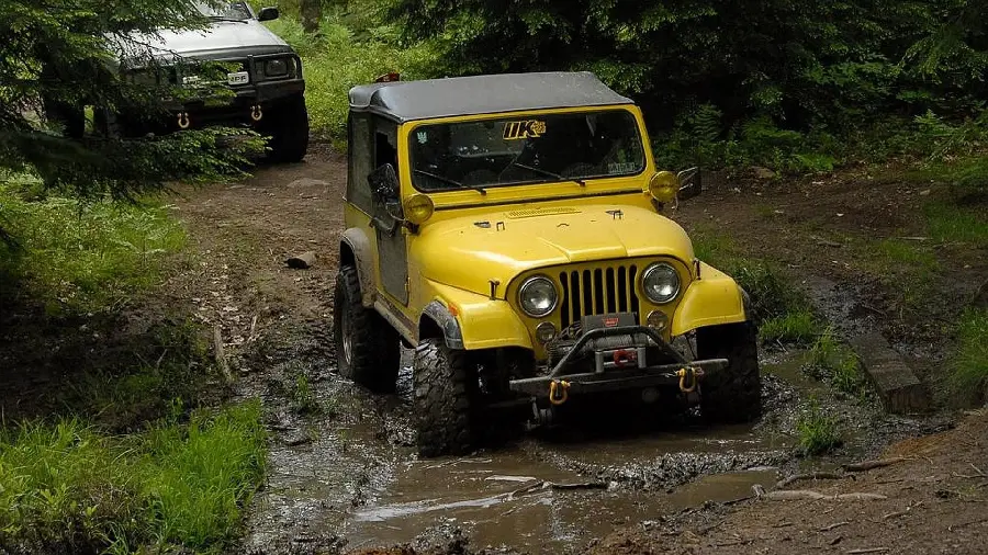 Interesting photo of a yellow Jeep crossing a river