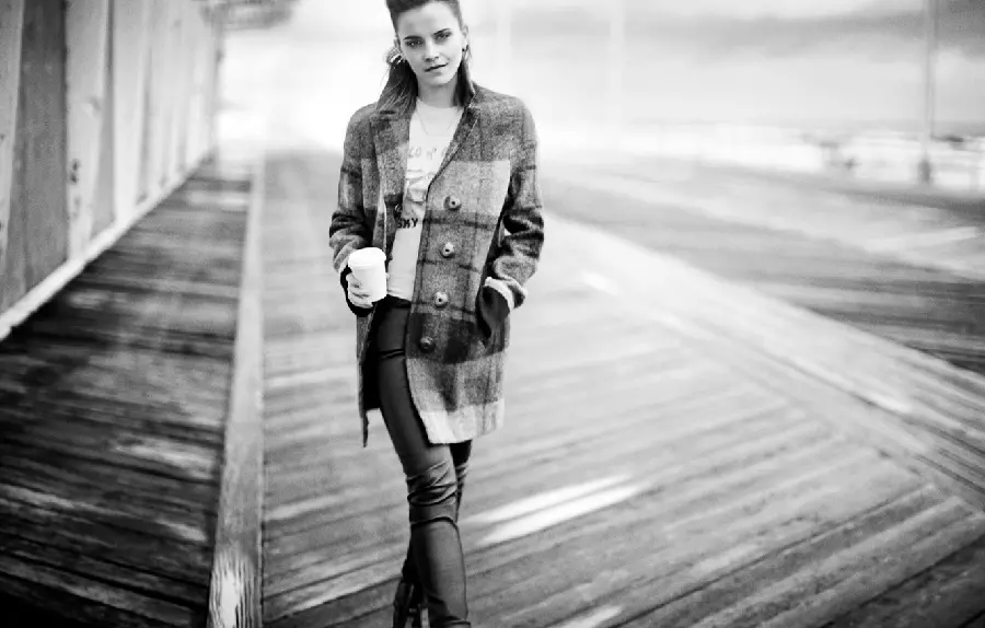 Wallpaper of Emma Watson, an English actress with a special pose