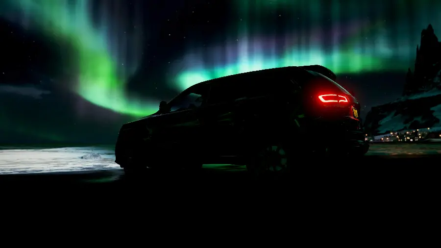 Photo of Jeep Grand Cherokee in the Northern Lights with a Dark Background