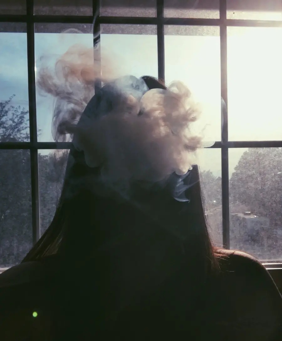 Download the profile of a girl smoking without a face