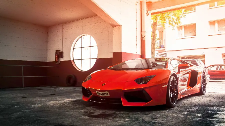 Photo of a red Lamborghini in a garage in full HD quality