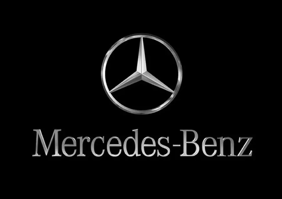Photo of Mercedes-Benz logo in black frame and absolute darkness