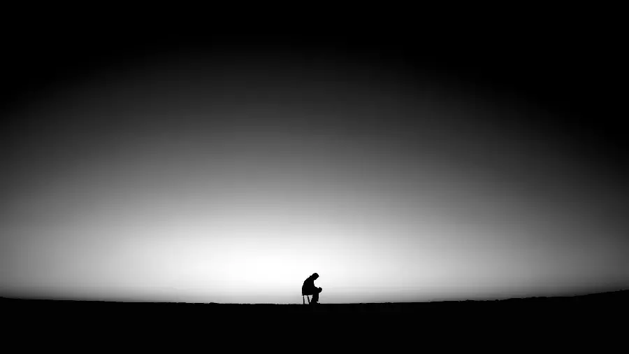 A very beautiful and conceptual profile photo without text of a sad thoughtful man