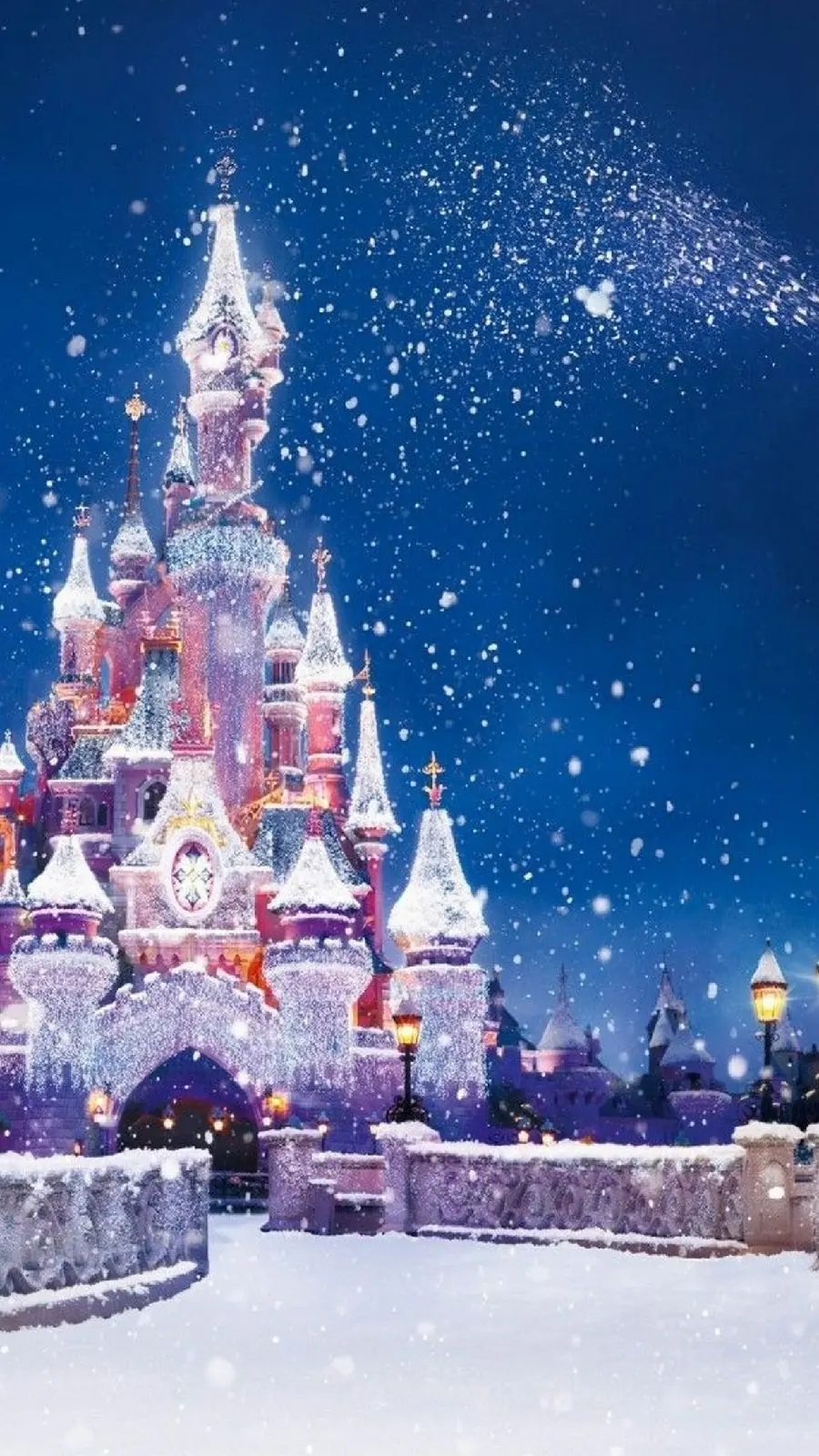 iPhone background and download iOS 15 iPhone wallpaper with Disneyland and a beautiful palace at Christmas