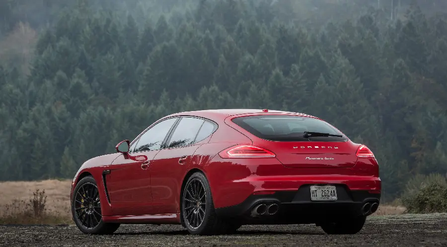 Image of the fast and luxurious Porsche Panamera sedan in Iran with red color