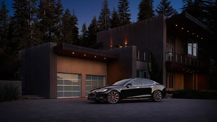 Photo of a black, proud and attractive Tesla
