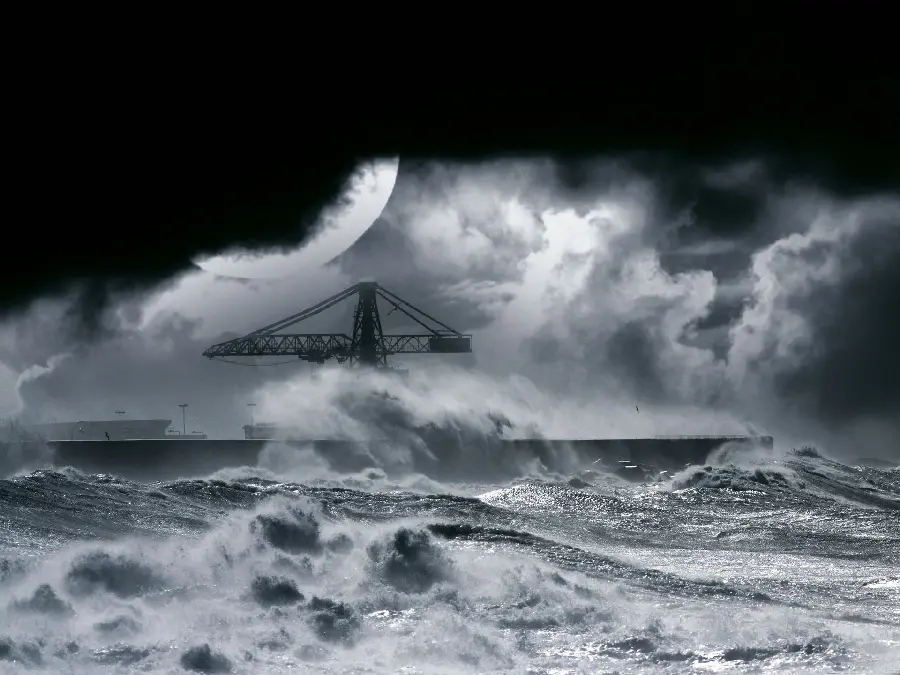 Download a very attractive black and white wallpaper of ocean waves at night near a large pier in Full HD quality