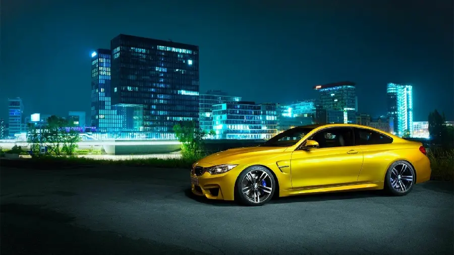 A very beautiful wallpaper of a BMW car Gold M3 with Sport Rims