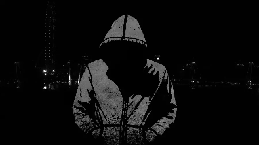 White hat hacker profile photo with a black background