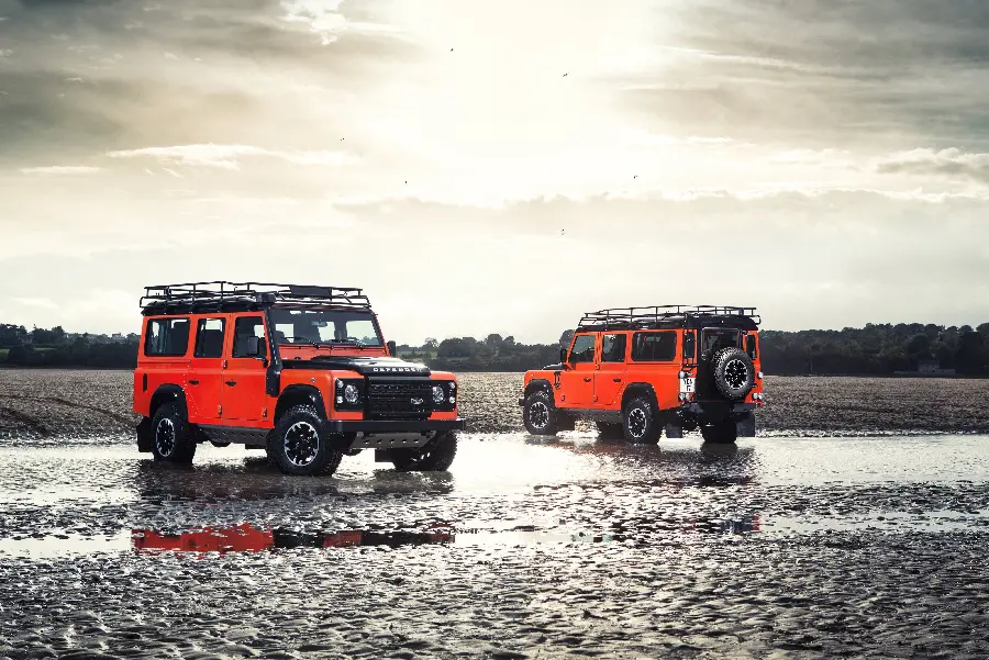 Photo and wallpaper of the red Land Rover Defender SUV